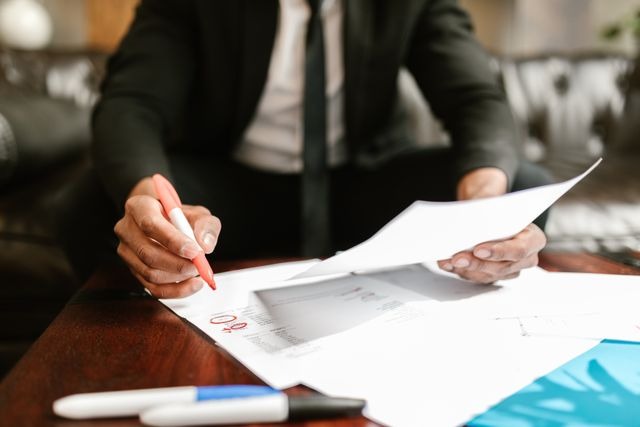 someone reviewing paperwork